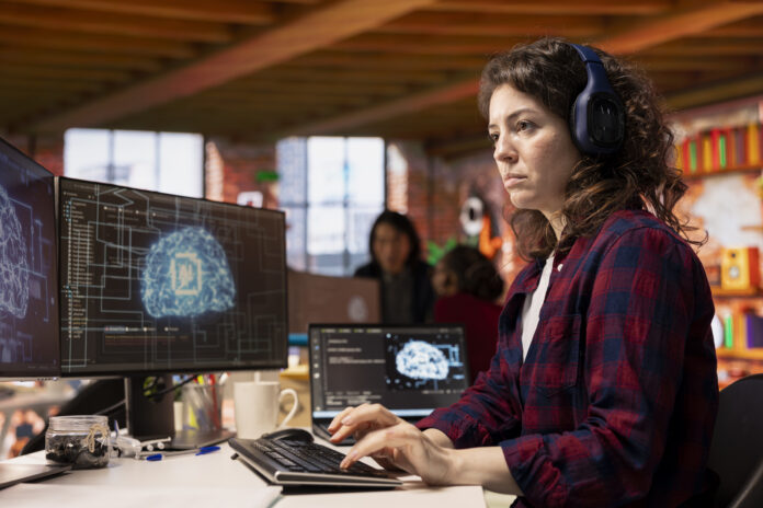IT expert listening music, using artificial intelligence technology